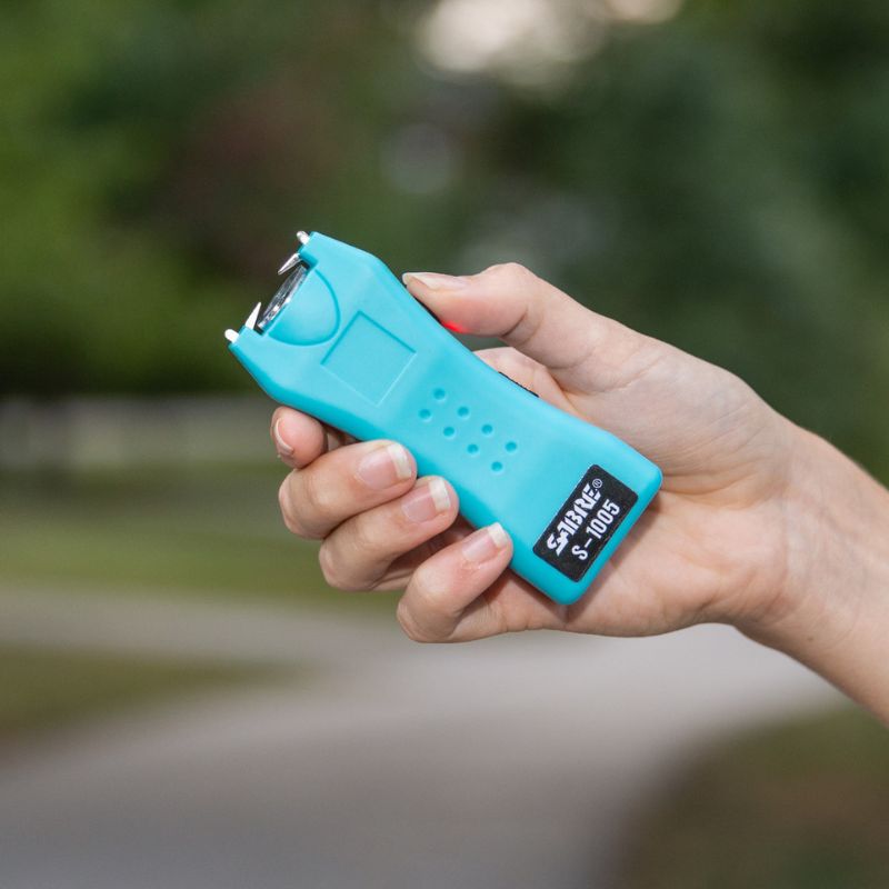 sabre-2-in-1-stun-gun-fako-120-lumen-s-1005-tq-turquoise-thiki-2